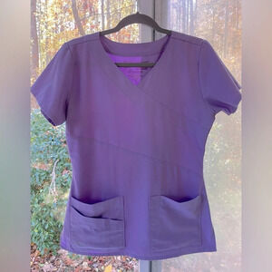Grey’s Anatomy S light eggplant scrub top in EUC w/multi functioning pockets.